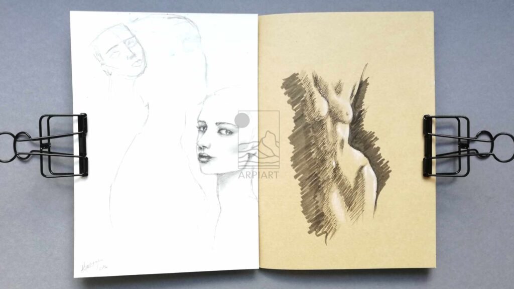sketchbook_page_ink_graphite_drawing_female_nude_arpiart.jpg